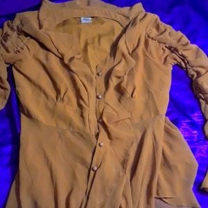 Mustard long sleeved ruffled blouse